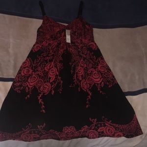 A beautiful red and black spaghetti strap dress.
